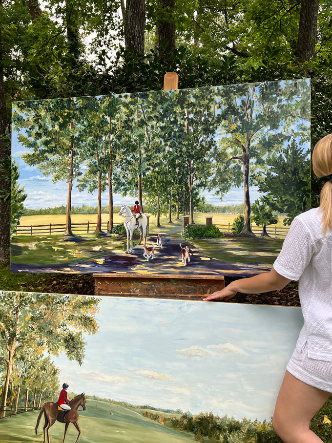  girl stands beside large oil paintings of hunt country virginia